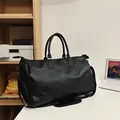 Black PU leather waterproof travel bag with shoe compartment for business trips. - Black