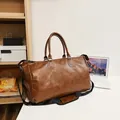 Vintage brown PU leather travel bag with shoe compartment for stylish business trips - Brown