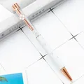 Elegant rose gold and white ballpoint pen with four-leaf clover and crystal details - 1.0mm Bullet Tip / Engraved White