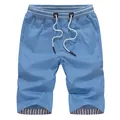 Light blue men's casual thin shorts with drawstring elastic waist and striped leg lining - M / Sky Blue