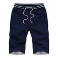 Casual men's navy blue summer shorts with drawstring waist and striped hem details - M / Royal Blue