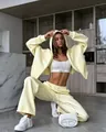 Stylish two-piece light yellow oversized zipper hoodie and matching sweatpants set for women - S / Yellow