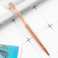 Elegant rose gold crystal ballpoint pen featuring a delicate four-leaf clover charm - 1.0mm Bullet Tip / Electroplated Rose Gold