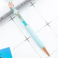 Elegant light blue crystal ballpoint pen with four-leaf clover charm and rose gold trim - 1.0mm Bullet Tip / Candy Light Blue