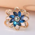 Elegant gold floral scarf buckle adorned with blue crystals and sparkling rhinestones - Golden Crystal Floral (DY0014)
