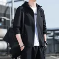 High-quality men's black slim-fit hooded windbreaker jacket for spring and autumn - M / Black