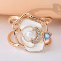Elegant rose shaped gold scarf ring with white enamel petals and pearl center detail - White Camellia (DY00010 White)