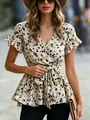 Detail view of women's V-neck leopard print blouse with stylish waist tie closure - S / Apricot