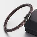 Detailed view of brown braided leather bracelet with black magnetic clasp - Small / Brown
