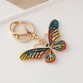 Porte-clés papillon coloré avec strass brillants et vibrants et finition dorée - Série Jaune