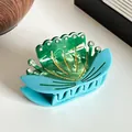 Pince à cheveux papillon élégante en résine avec strass en turquoise et vert. - Lotus Vert Micro-strass