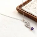 Elegant silver-toned titanium steel necklace with a purple gemstone pendant detail - Tulip Purple Gemstone Style (2396 Steel Tone Micro-Pave Pendant) / Steel