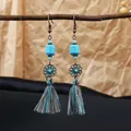 Bohemian style turquoise tassel earrings with vintage bronze flower accents and blue threads - Bronze Ornament Mixed Tassel Style (E2337-1)