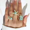 Ensemble de bagues bohèmes en étoile de mer et coquillages avec émail bleu clair - Style Océan Tons Bleus (32713) / Or