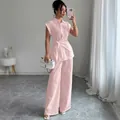 Elegant two-piece set featuring a pink short-sleeved shirt and matching wide-leg pants - S / Light Pink