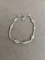 Bracelet en maille argentée avec perles ambrées et breloque rose - Bracelet / Argent-Café