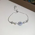 Primer plano de pulsera elegante de plata con perlas y motivo de estrella, ajustable. - Estilo de Estrella y Luna 2# / Plateado