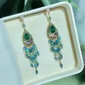 Close-up of bohemian crystal tassel earrings with emerald stones and blue crystal drops. - Stud Earring (2#) / Green