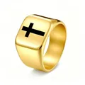Macro view of gold signet ring featuring a bold black cross engraving on its face - Size 6 / Gold
