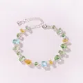 Detailed view of a delicate silver chain bracelet with colorful multi-shaped zircon stones - Fresh Candy Silver