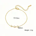 Pulsera de acero de titanio dorado con tres colgantes de circonita, longitud de 17+5 cm - Pulsera con Colgante Circular (E2537) / Dorado