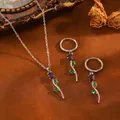 Détail d'un ensemble collier et boucles d'oreilles en acier avec fleurs en zircons violets et verts - Tulipe (T079) / Parure Collier et Boucles d'Oreilles Strass Violet / Argent