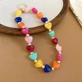 Detailed macro view of bohemian style colorful heart-shaped acrylic bead necklace - Colorful Heart Beaded Necklace (50#) / Gold-Multicolor