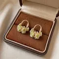 Exquisite vintage resin flower basket earrings with green roses and sparkly rhinestones - Gold-Green