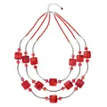 Detailed view of triple-layered necklace with red square beads and silver tubes - Dark Red