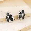 Silver-toned stainless steel teardrop earrings with black enamel flower and center crystal - Teardrop Enamel Floral (KE115080-K)