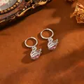 Eleganti orecchini a cerchio argentati con ciondoli a cigno in zircone rosa per donna - Orecchini A Cigno T064 In Argento E Diamanti Rosa