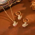 Elegante set gioielli cigno rosa comprensivo di collana e orecchini a cerchio oro - Set Cigno T064 Con Polvere D'oro E Diamanti