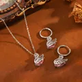 Elegante set di gioielli a cigno con pietre rosa a goccia e catena d'argento. - Set T064 Cigno In Argento E Diamanti Rosa
