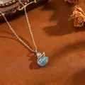 Collana con ciondolo a forma di cigno elegante, occhio di gatto blu e zirconi in argento - Collana T064 Cigno In Argento E Diamanti Blu