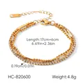 Detailed close-up of a three-layer gold stainless steel bracelet with sparkling zirconia - Triple Layer Mix