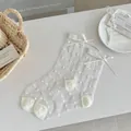 Elegant sheer white mid-calf mesh socks featuring white heart patterns and bow detail - One Size / Heart Pattern (Cream White)