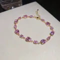 Eleganter vergoldeter Armreif im französischen Stil mit funkelnden rosa Zirkonia - Französischer Rosa Wassertropfen-Stil (33#)