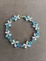 Elegant silver bracelet with blue and white CZ flower design for a stylish look - Flower Style / Silver-Blue