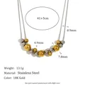 Vue détaillée du collier en acier inoxydable bicolore avec perles en or 18 carats - Style Double Chaîne à Billes Bicolore (N3557_Gold_2)