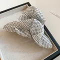 Close-up of French style polka dot cloud hair claw clip with sheer ruffled fabric. - Standard Quality (No. 1) / White Polka Dot