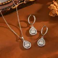Detail view of French style silver teardrop necklace and earring set with crystals. - Waterdrop Jewelry Set / Silver
