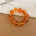 Handmade amber acrylic beaded bracelet with gold spacers for summer dopamine style - Bracelet / Brown