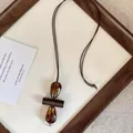 Vintage Maillard style wooden and resin geometric oval pendant sweater chain necklace - Coffee - Amber Brown