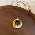 Handmade ethnic style wooden circular pendant necklace with vibrant multicolored thread wrapping - Double Ring Colored Thread Wrapped Style (8#)