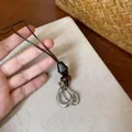 Retro Maillard style necklace with wooden beads and silver geometric oval pendants - Coffee - Silver Combination
