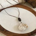 Vintage wood resin oval pendant necklace with earthy tones for a Maillard style look - Black - Transparent