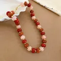 Close-up view of Maillard style acrylic beaded necklace with vibrant red and orange tones - Maillard Style Beaded Necklace (44#) / Gold-Red Pink Orange
