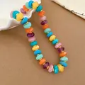 Close-up detail showing vibrant colorful acrylic beads and golden spacers of the necklace - Multicolor Patchwork Flat Round Bead Necklace (48#) / Gold-Multicolor
