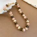 Detail shot of Maillard style acrylic beaded necklace with pink and brown stones - Pink-Brown Marble Round Bead Necklace (46#) / Gold-Pink Brown