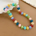 Close-up detail of a colorful acrylic beaded necklace with elegant golden spacer beads - Colorful Flat Round Bead Necklace (43#) / Gold-Multicolor